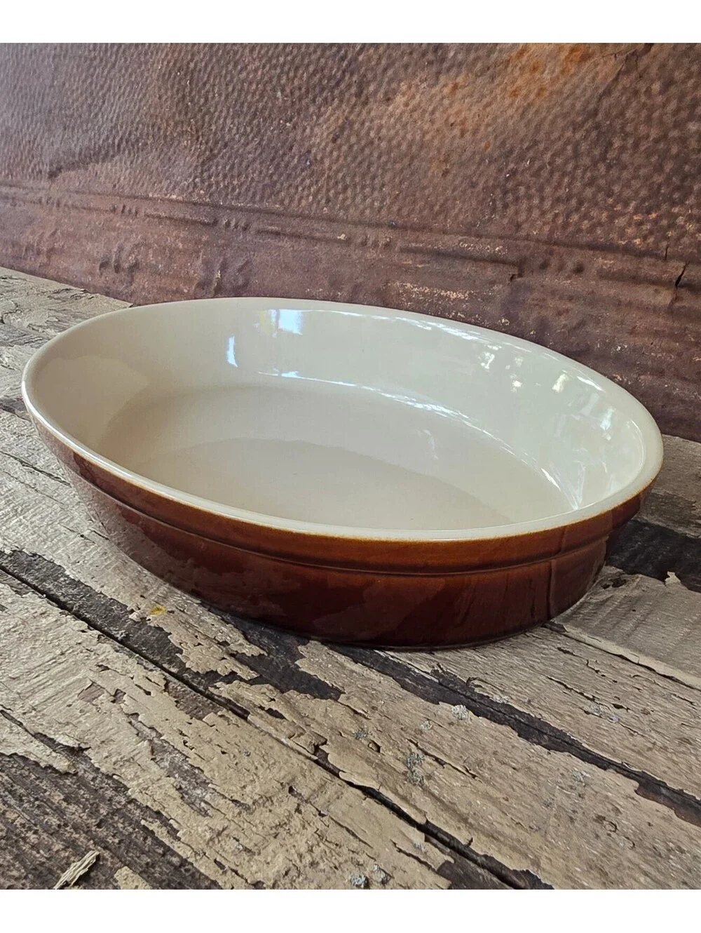 Vintage Ceramic oval baking dish with brown exterior and cream interior